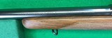 Pre-64 M70 Winchester from 1952 with 2-7X Burris scope. - 14 of 14