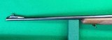 Pre-64 M70 Winchester from 1952 with 2-7X Burris scope. - 11 of 14