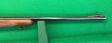 Pre-64 M70 Winchester from 1952 with 2-7X Burris scope. - 7 of 14