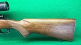 Pre-64 M70 Winchester from 1952 with 2-7X Burris scope. - 12 of 14