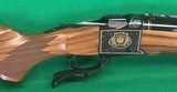 Ruger #1 50th anniversary 45-70, engraved with gold accents. Appears unfired. - 1 of 12