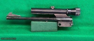 Thompson Center contender octagon 38 Special barrel with scope.