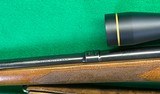 Model 70 from 1951 in 270 with high end Leupold Red dot scope. - 4 of 10