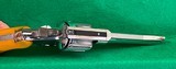 S&W pre-26 model of 1950, nickle with rare 5 inch barrel and Catalin grips. - 7 of 8