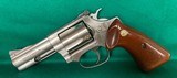 Mint S&W model 60 with adjustable sights and smooth target grips. - 1 of 7