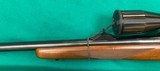 257 Roberts, Tang safety M77 Ruger with sights and scope. - 8 of 10