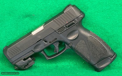 Taurus G3 9mm with Crimson trace red dot.