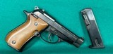 Beretta model 84, caliber 380 with 2 clips.