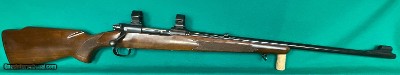 Pre-64 Model 70 Winchester featherweight in 30-06, exceptional condition.