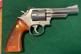 Stainless steel S&W model 66-1, 4 inch barrel, target grips. - 1 of 2