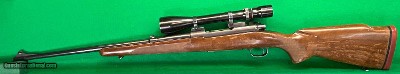 Pre-64 (1959) M70 Winchester in 338 magnum with early B&L scope.
