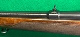 Pre-64 Model 70 in rather scarce 300 H&H, stock shows some wear. - 7 of 10