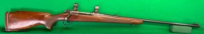 Pre-64 Model 70 in rather scarce 300 H&H, stock shows some wear.