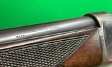 1886 Winchester in 33 WCF, checkered stock, plus climbing Lyman peep sight. - 14 of 14