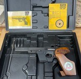 Walther GSP 22 LR in the box with extra clip and accessories.