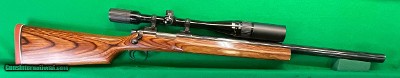 Remington 700 with custom heavy barrel in 222 Remington magnum with B&L scope