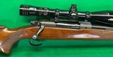 Pre-64 Winchester model 70 in 375 H&H magnum with newer Redfield scope. - 3 of 4
