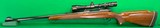 Pre-64 Winchester model 70 in 375 H&H magnum with newer Redfield scope. - 2 of 4