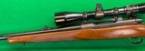 Pre-64 Winchester model 70 in 375 H&H magnum with newer Redfield scope. - 4 of 4