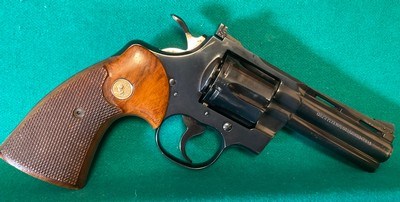 Early four inch Python, dates to1969, excellent condition.