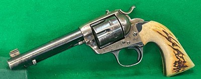 Colt Bisley, 32-20, custom sights and grips.