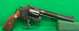 Early Smith & Wesson K22 from 1951, 5 screw with original diamond grips.