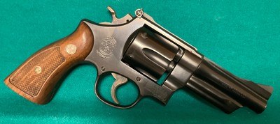 Immaculate Early Smith & Wesson model 28-2 with diamond grips, 4 inch 357 Magnum