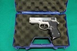 Smith & Wesson Model 4003 Stainless .40 S&W Pistol - 1 of 2
