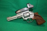 Smith & Wesson Model 617-2 10 Round .22 LR Revolver W/ Bushnell Red Dot - 1 of 3
