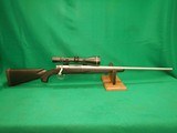Remington Model 700 300 Win Mag Rifle W/ Scope - 1 of 8