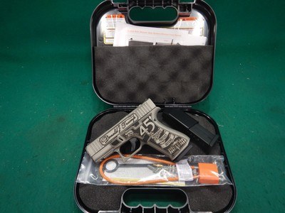 GLOCK 43XMOS FXD 5.5lb w/front rail Aus Trump2024 Crush Silv Distressed New - Image 1 of 3