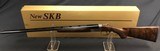 SOLD !!! SKB SPORTING CLAYS385 28GA EXCELLENT WITH BOX - 1 of 21
