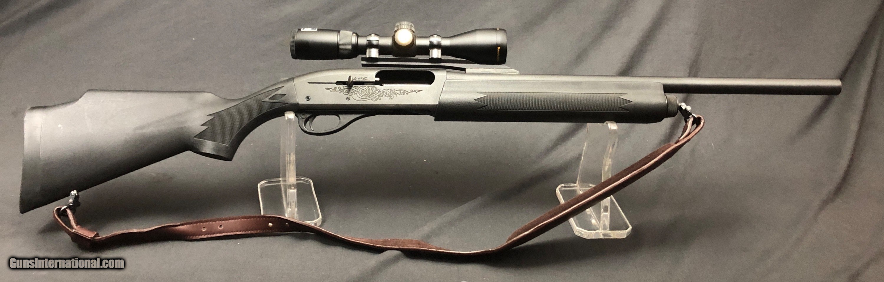 SOLD !!! 1100 SLUG GUN WITH SCOPE AND SLING