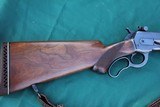 Winchester Model 71 Deluxe in 348 Winchester - 1 of 14