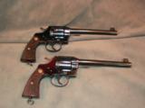 Cased consecutive pair of Colt New Service Target Revolvers - 1 of 11