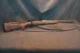 Cooper M54 Jackson Excaliber 308Win desert camo - 1 of 5