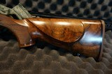 Remington Custom Shop 547 D Grade 17HMR factory engraved new in the factory deluxe case. - 2 of 17