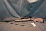 Weatherby Left Hand Mark V Accumark 6.5x300WbyMag with Leupold 4.5-14x50 - 1 of 5