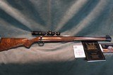 Cooper 57M 22LR Mannlicher Full Stock with quarter rib
rear sight and hooded front sight.WOW!!