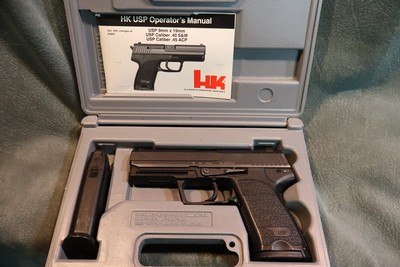 H+K USP 40S+W with box,extra magazine and papers.