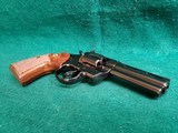 COLT PYTHON - BLUED. 4 INCH BARREL. ORIGINAL GRIPS. W-OWNERS MANUAL. NEAR MINT AND GORGEOUS! MFG. IN 1976 - .357 MAGNUM - 10 of 15