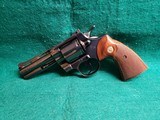 COLT PYTHON - BLUED. 4 INCH BARREL. ORIGINAL GRIPS. W-OWNERS MANUAL. NEAR MINT AND GORGEOUS! MFG. IN 1976 - .357 MAGNUM - 5 of 15