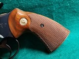 COLT PYTHON - BLUED. 4 INCH BARREL. ORIGINAL GRIPS. W-OWNERS MANUAL. NEAR MINT AND GORGEOUS! MFG. IN 1976 - .357 MAGNUM - 12 of 15