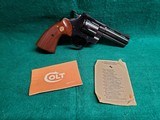 COLT PYTHON - BLUED. 4 INCH BARREL. ORIGINAL GRIPS. W-OWNERS MANUAL. NEAR MINT AND GORGEOUS! MFG. IN 1976 - .357 MAGNUM - 1 of 15