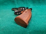 COLT PYTHON - BLUED. 4 INCH BARREL. ORIGINAL GRIPS. W-OWNERS MANUAL. NEAR MINT AND GORGEOUS! MFG. IN 1976 - .357 MAGNUM - 14 of 15