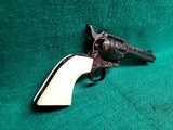 COLT - SINGLE ACTION ARMY MATCHING PAIR. BEAUTIFULLY ENGRAVED BY VALENYA. W-REAL IVORY GRIPS. 1971 NRA CENTENNITAL. GORGEOUS! - .45 COLT - 10 of 25