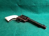 COLT - SINGLE ACTION ARMY MATCHING PAIR. BEAUTIFULLY ENGRAVED BY VALENYA. W-REAL IVORY GRIPS. 1971 NRA CENTENNITAL. GORGEOUS! - .45 COLT - 23 of 25