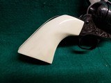 COLT - SINGLE ACTION ARMY MATCHING PAIR. BEAUTIFULLY ENGRAVED BY VALENYA. W-REAL IVORY GRIPS. 1971 NRA CENTENNITAL. GORGEOUS! - .45 COLT - 20 of 25