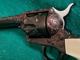 COLT - SINGLE ACTION ARMY MATCHING PAIR. BEAUTIFULLY ENGRAVED BY VALENYA. W-REAL IVORY GRIPS. 1971 NRA CENTENNITAL. GORGEOUS! - .45 COLT - 15 of 25