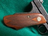 COLT - WOODSMAN MATCH TARGET 1ST SERIES 6.5 INCH BARREL. ENGRAVED BY BILL SEVERSON GOLD INLAYS. GORGEOUS W-MINTY BORE! MFG 1939 - .22 LR - 19 of 26